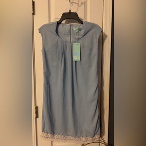 NEW WITH TAGS 
Carolina Blue Boutique Dress with Cream Embroidery on the bottom